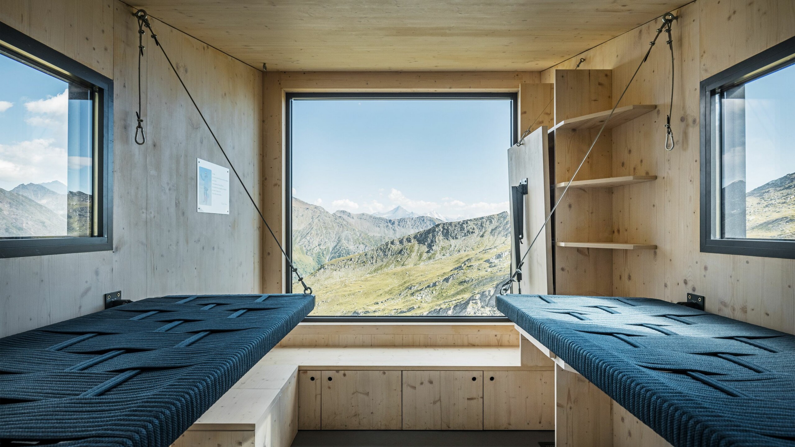 View of the interior including sleeping and storage facilities, the windows give you a far-reaching view of the breathtaking natural surroundings.