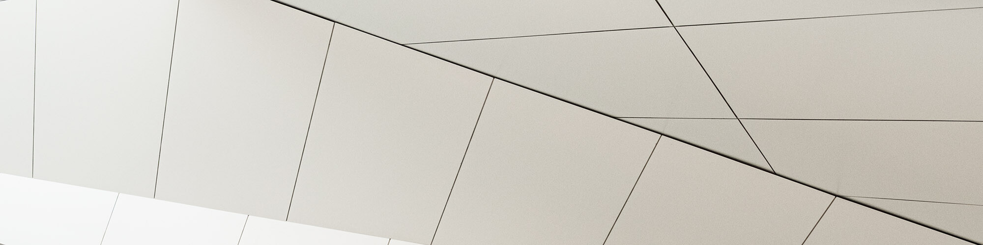 Close-up of a pure white section of the roof, its dynamic structure can be seen.