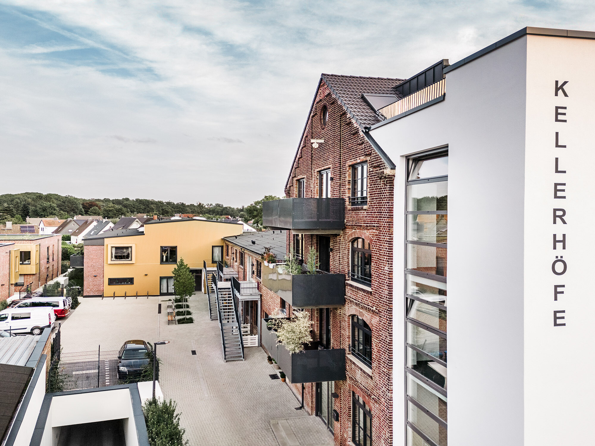 A view of the Kellerhöfe site from a bird's eye view from the side, with the word "KELLERHÖFE" written vertically on the building to the right.