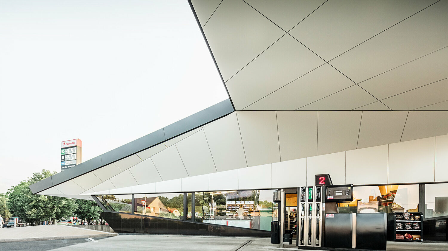 The roof of the petrol station from below: The triangles and trapezoids give it an unusual structure.