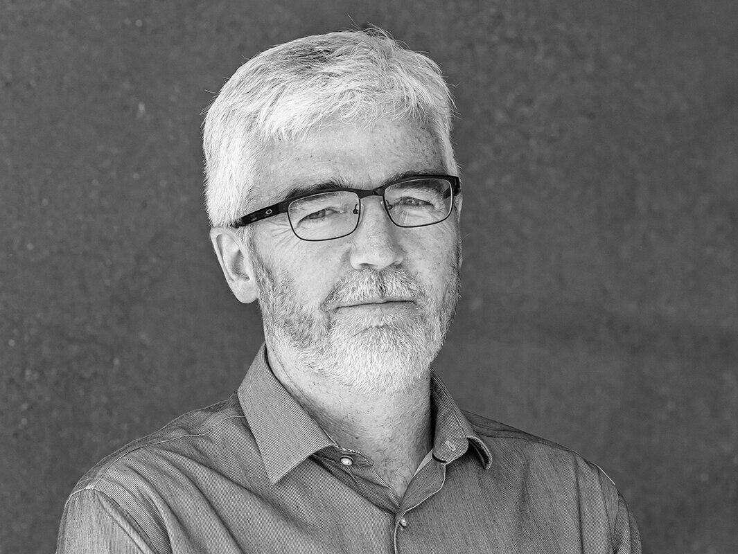 Black and white portrait of architect Tony Hoare from Wilkie + Bruce Architects.
