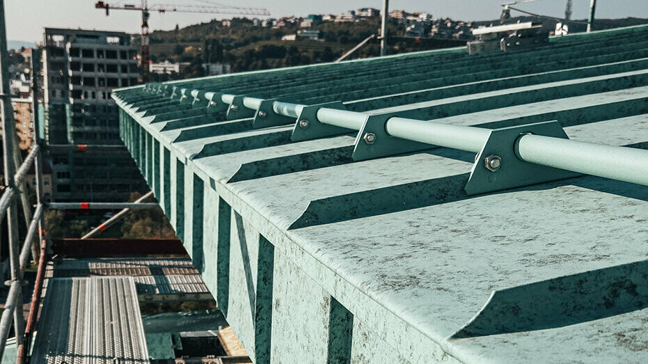 administrative building, Spilka Offices, construction site, Prefalz, P.10 patina green, monument protection, snow guards