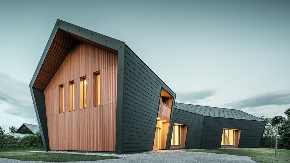 Overall view of the bouldering hall in Pevno by sunset light in the interior