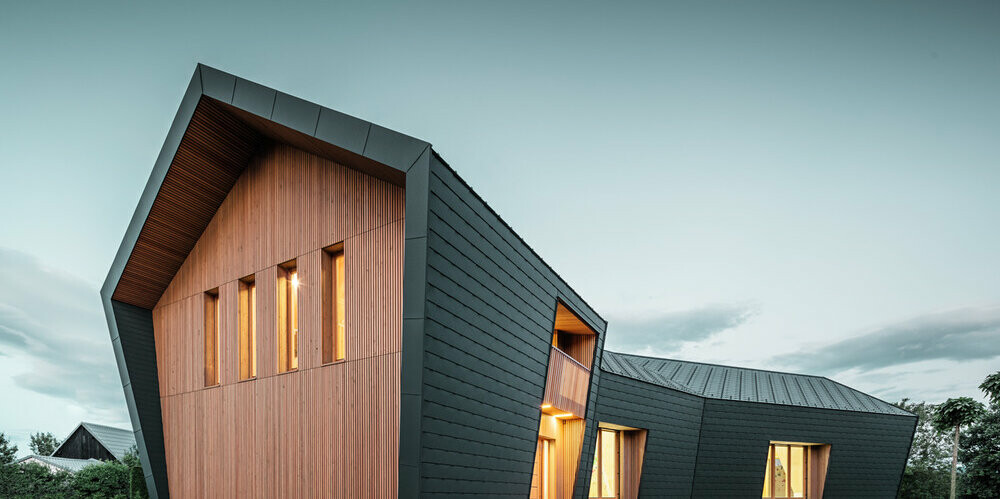 Overall view of the bouldering hall in Pevno by sunset light in the interior