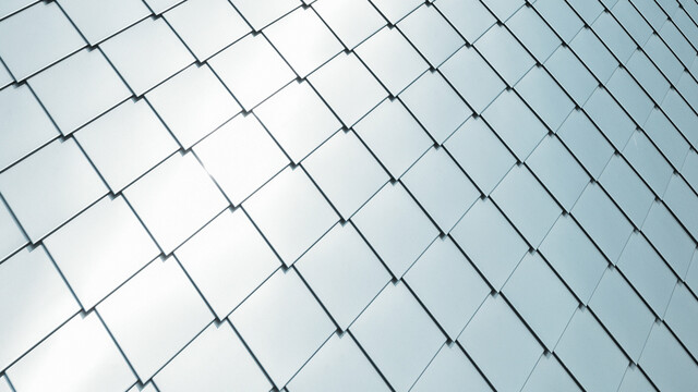 PREFA rhomboid façade tile 20 × 20installed, detailed view in plain aluminium
