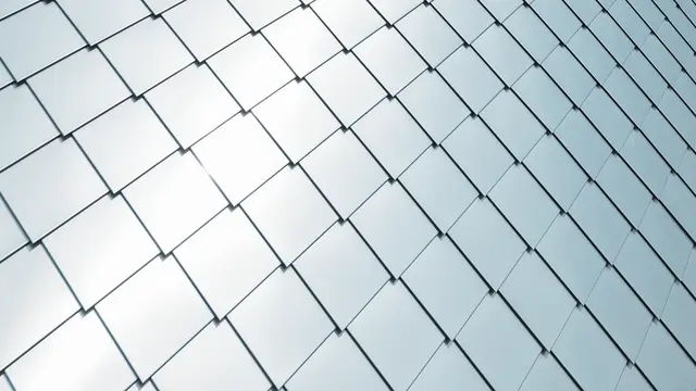 PREFA rhomboid façade tile 20 × 20installed, detailed view in plain aluminium