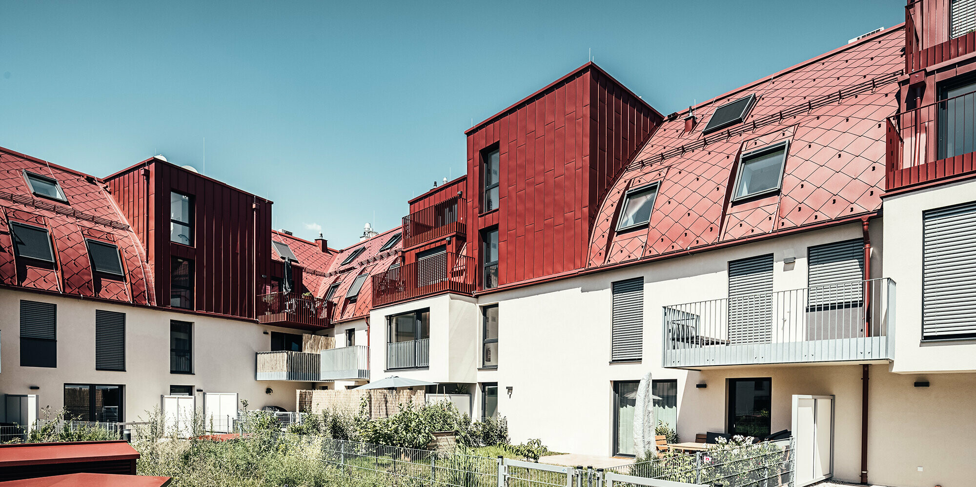 Various views and close-ups of the building's roofscape.