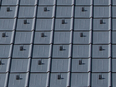 PREFA roof tiles with snow guards in P.10 anthracite
