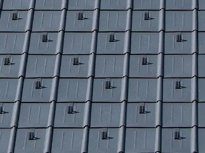 PREFA roof tiles with snow guards in P.10 anthracite