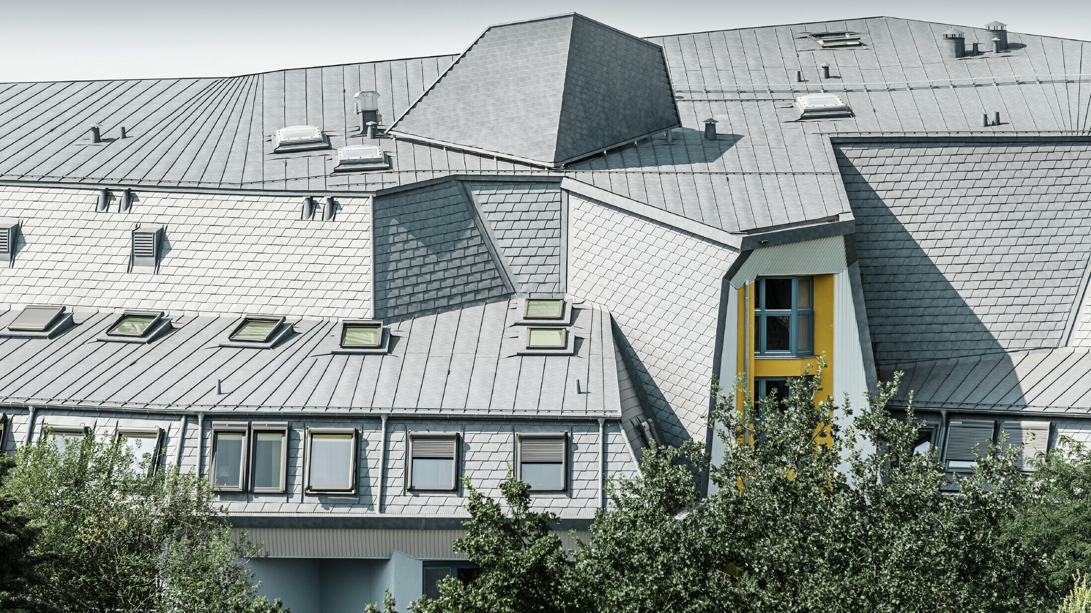 renovated roof with various roof windows, detail, aluminium roof made of Prefalz and PREFA shingles