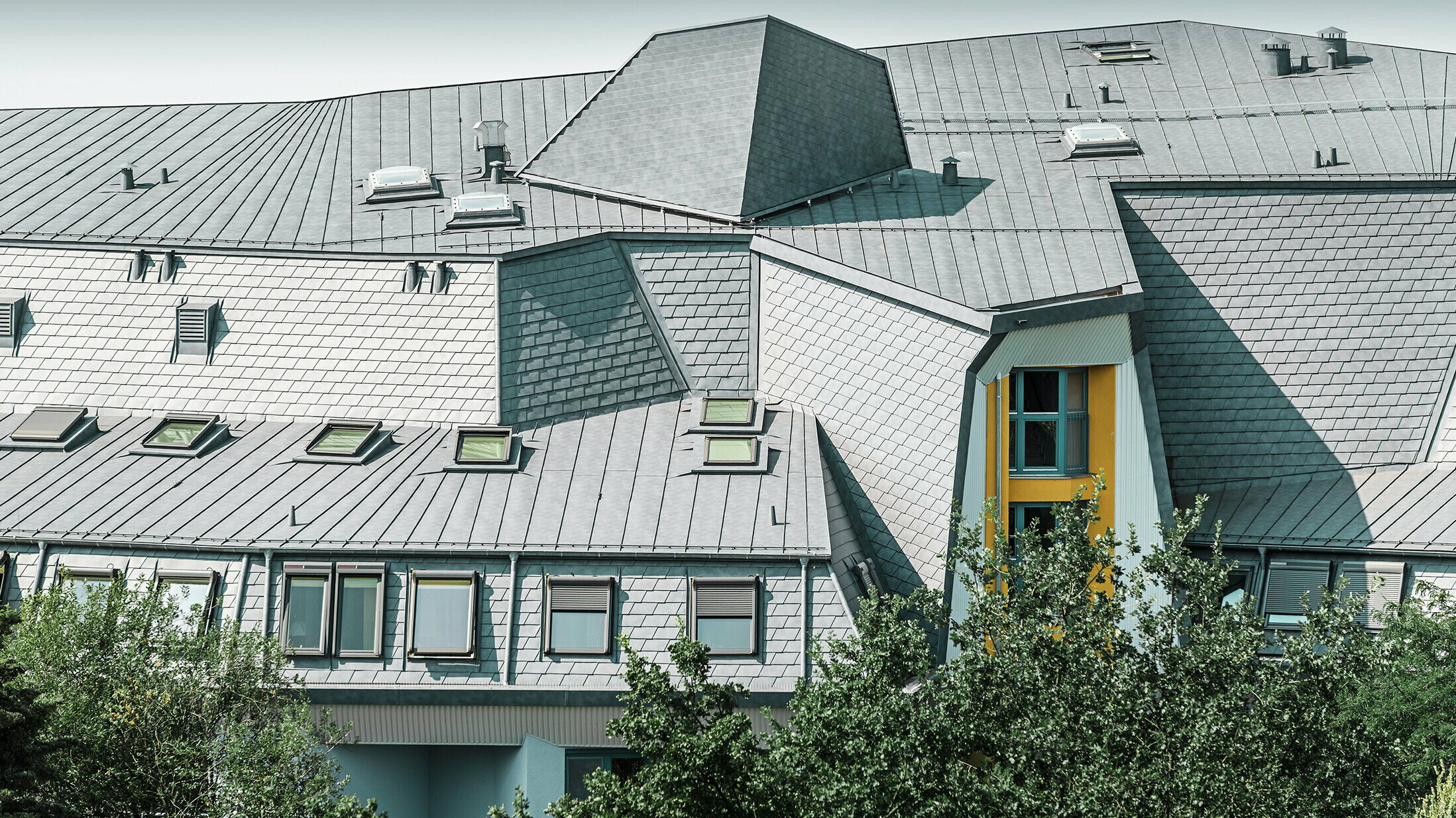 renovated roof with various roof windows, detail, aluminium roof made of Prefalz and PREFA shingles