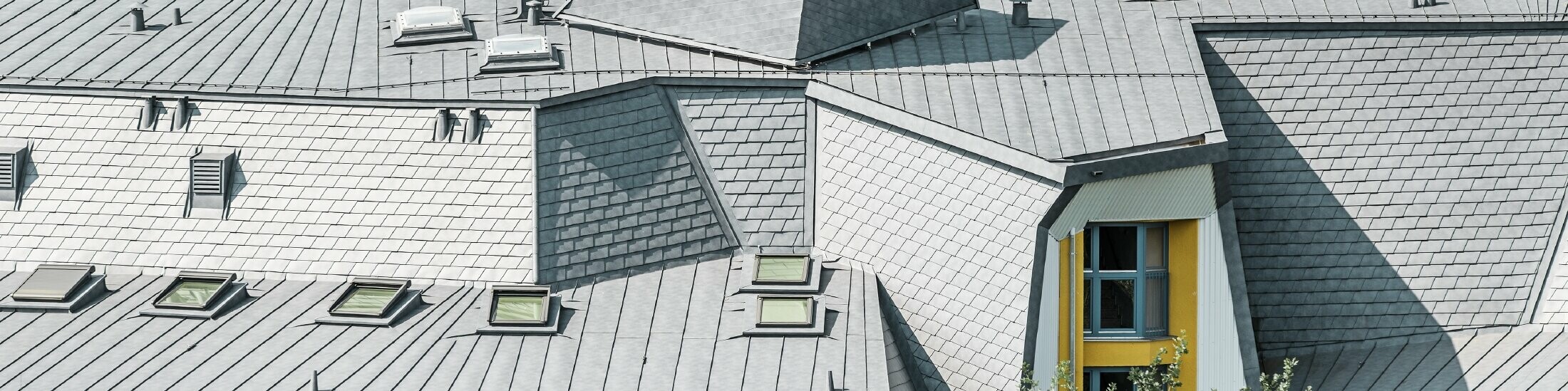 renovated roof with various roof windows, detail, aluminium roof made of Prefalz and PREFA shingles