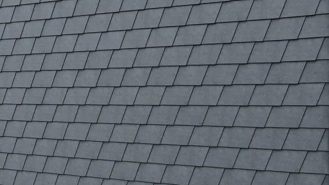 Detailed image of the PREFA façade shingle in P.10 stone grey