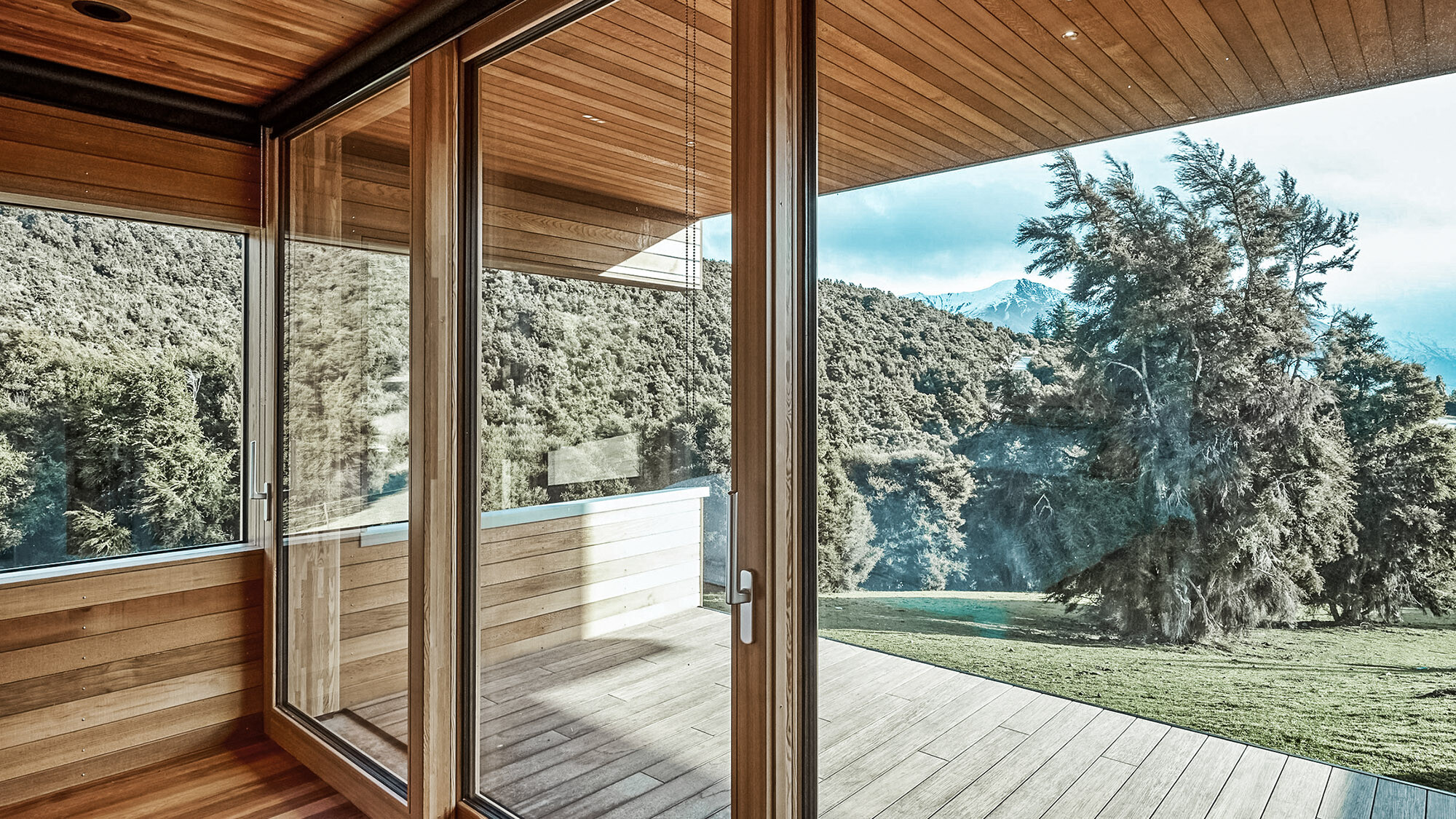 View of the vast natural scenery of Kanuka Valley through the window front.