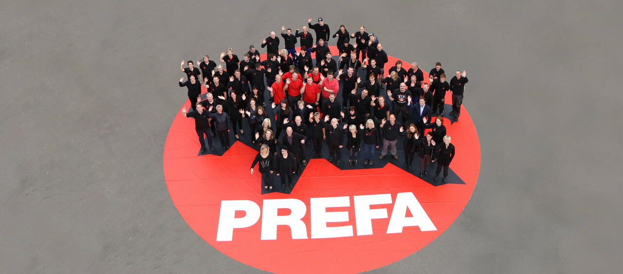 Shot of PREFA contact persons waving.