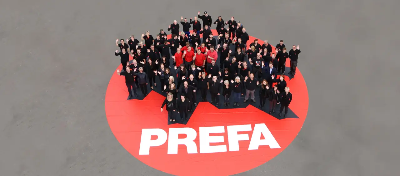 Shot of PREFA contact persons waving.
