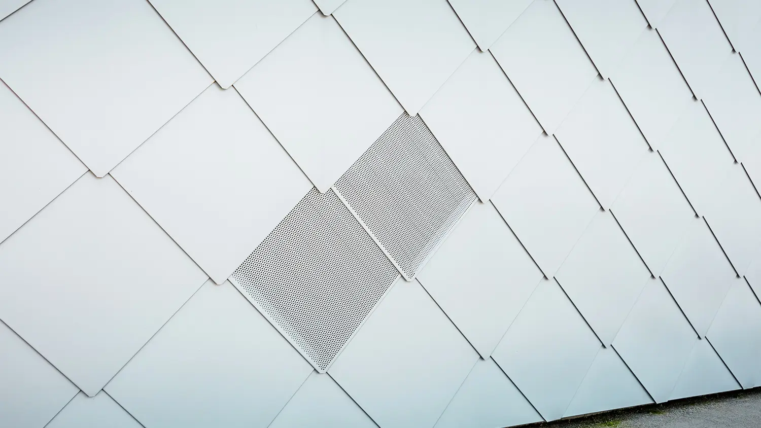 Close-up of the façade with the ventilation in view.