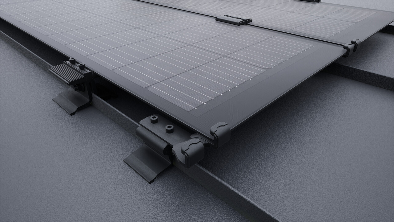 Close-up of the PREFALZ solar module with black slip guard. The modules are mounted directly on the seams of the PREFALZ roof system.