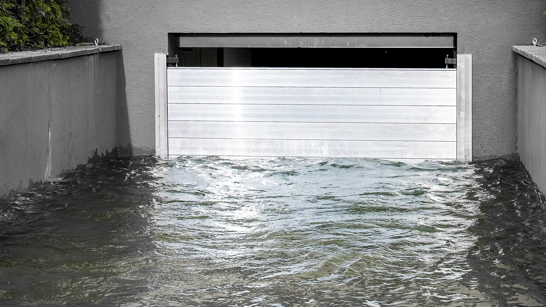 Garage of a detached house with PREFA flood protection