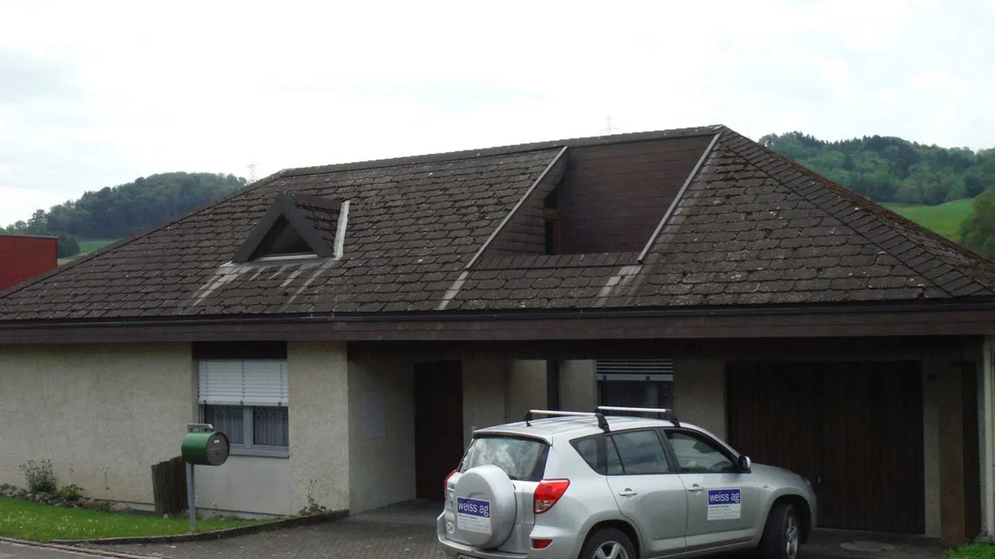 Before roof renovation with PREFA roof tiles and a pitched dormer