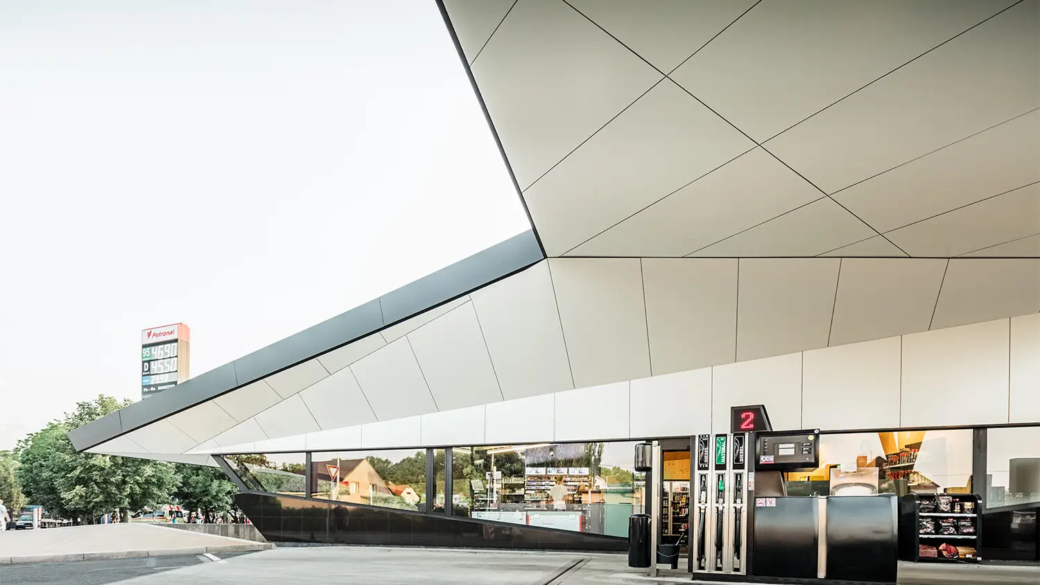 The roof of the petrol station from below: The triangles and trapezoids give it an unusual structure.