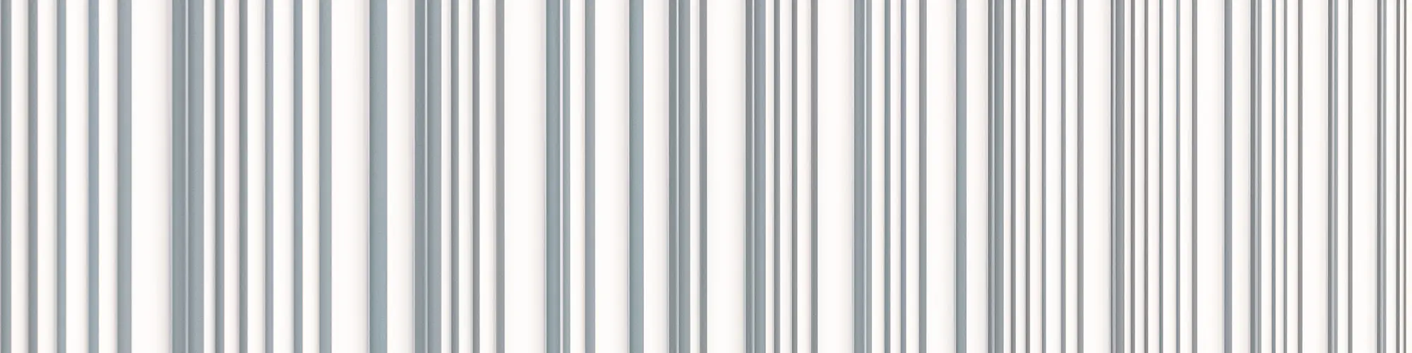 A close-up of the pure white PREFA façade with a profile and its irregular wave character.