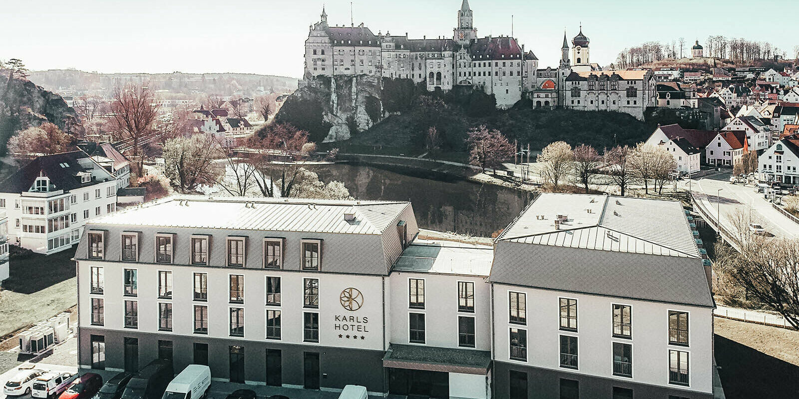 The front view from above of the Karls Hotel looking towards the Danube Sigmaringen Castle.