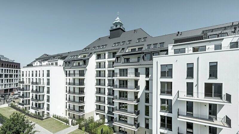 In the "Marie" project, an old hospital was converted and renovated into a residential complex. The buildings are roofed in rhomboid roof tiles 29x 29 and Prefalz