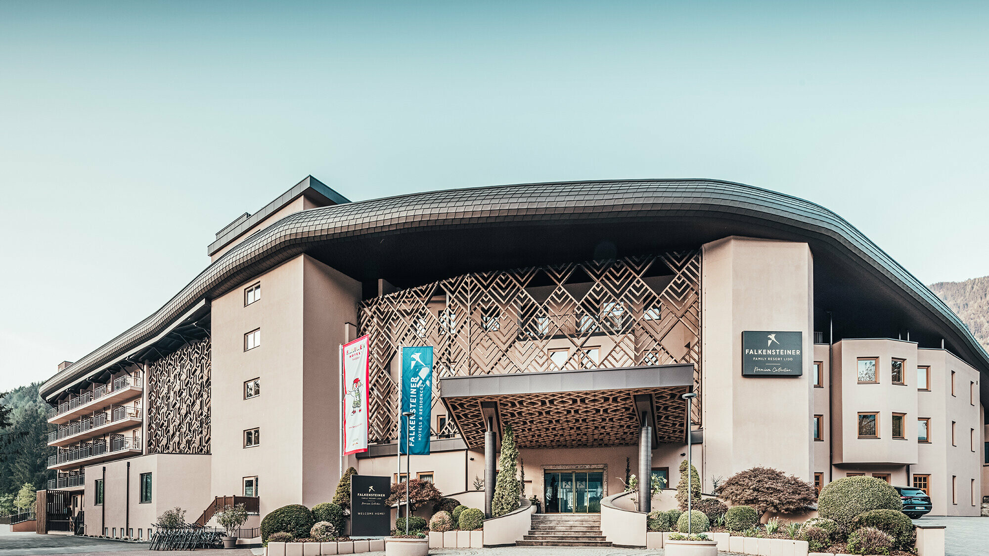 Front view of the entrance area of the Falkensteiner Hotel in South Tyrol.