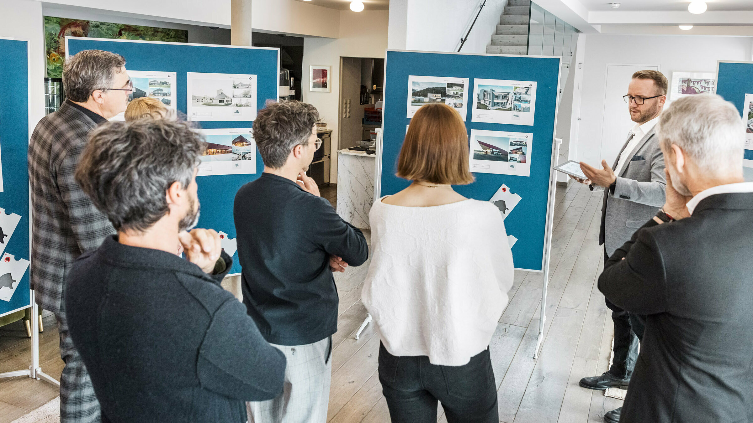 Part of the expert jury looking at the project sheets.