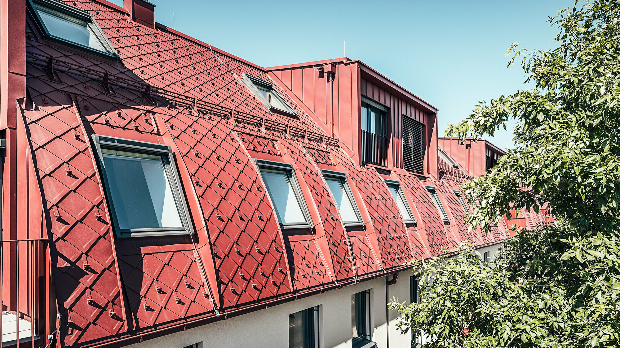 Various views and close-ups of the building's roofscape.