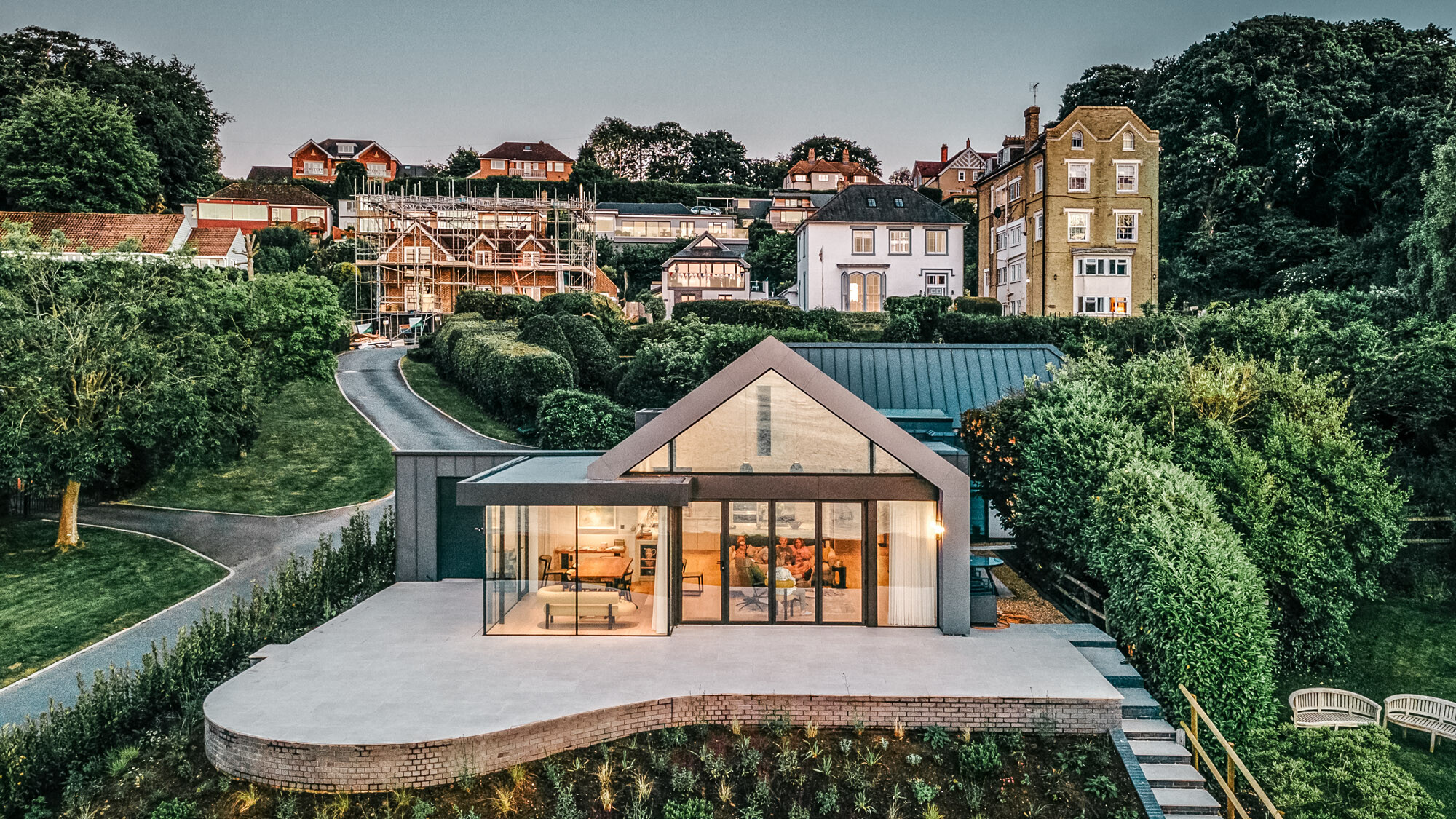 The building from the beach side from slightly above: The green areas, terrace and Victorian houses behind it can be seen.