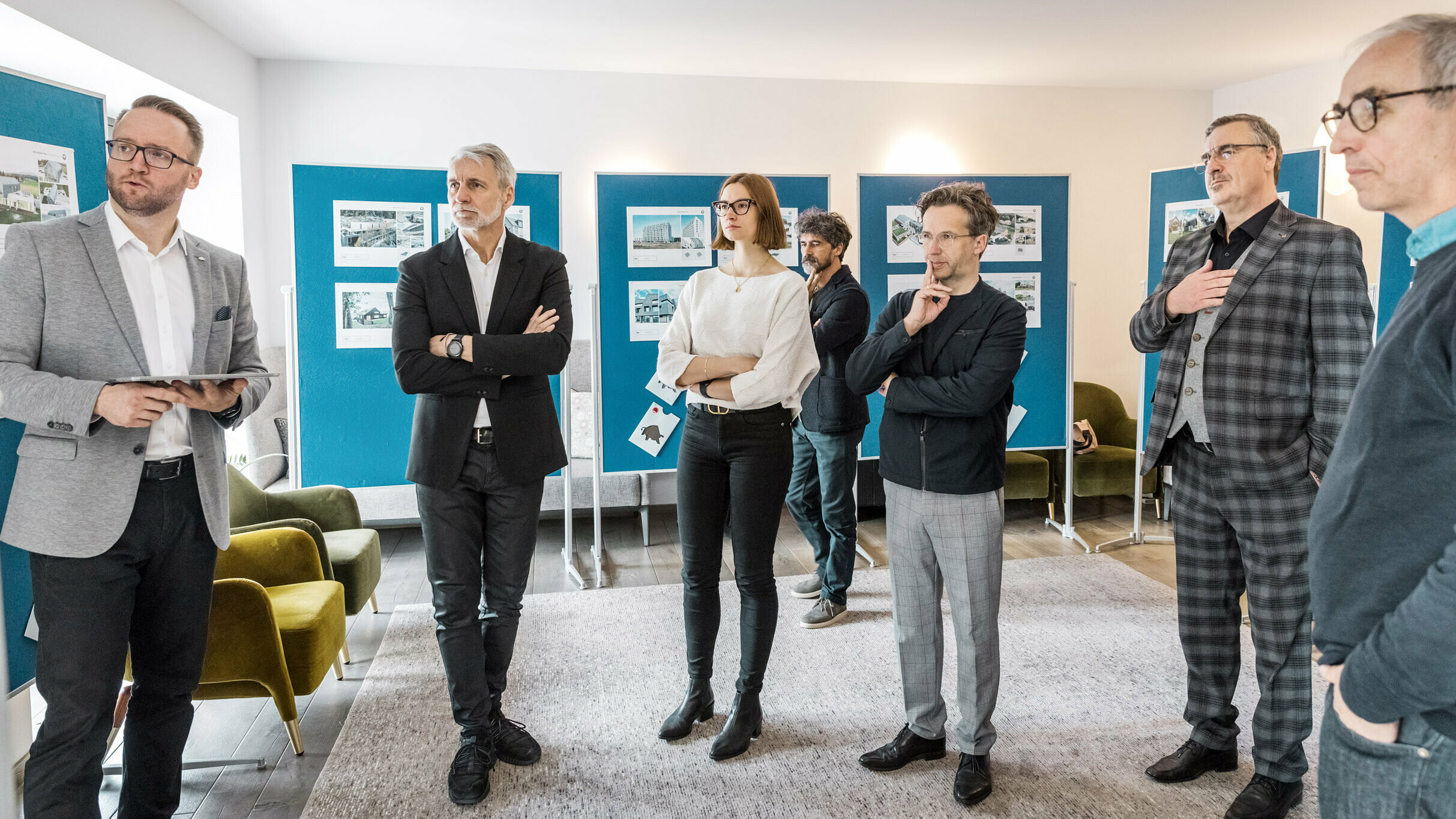 Part of the expert jury looking at the project sheets.