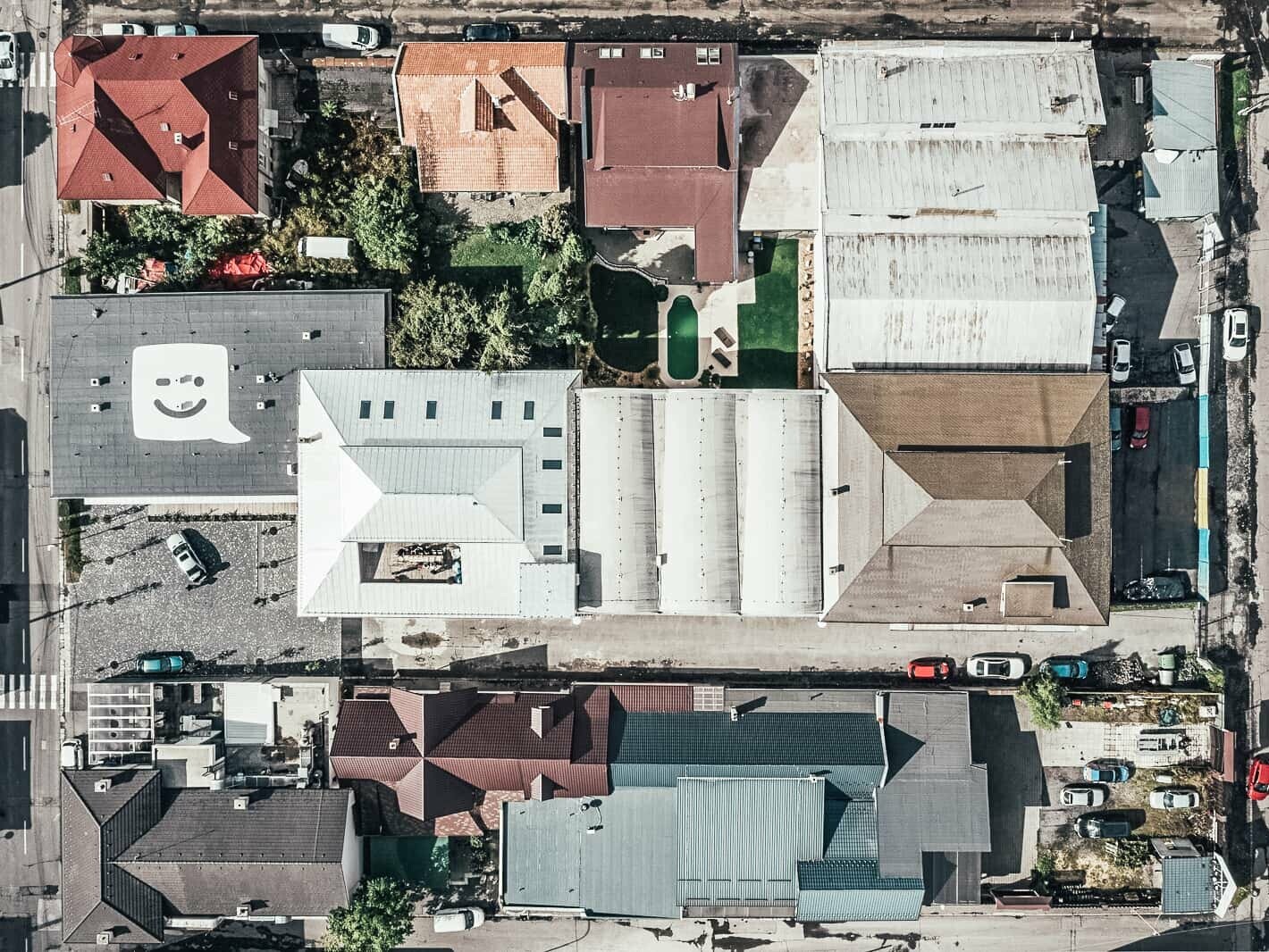 Top view of the enamel factory in Lučenec, Slovakia. You can see various roofes in differnt colours. The PREFA roof is located in the middle of the picture. 