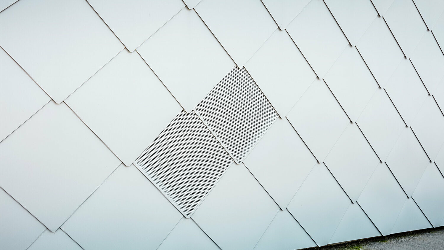 Close-up of the façade with the ventilation in view.