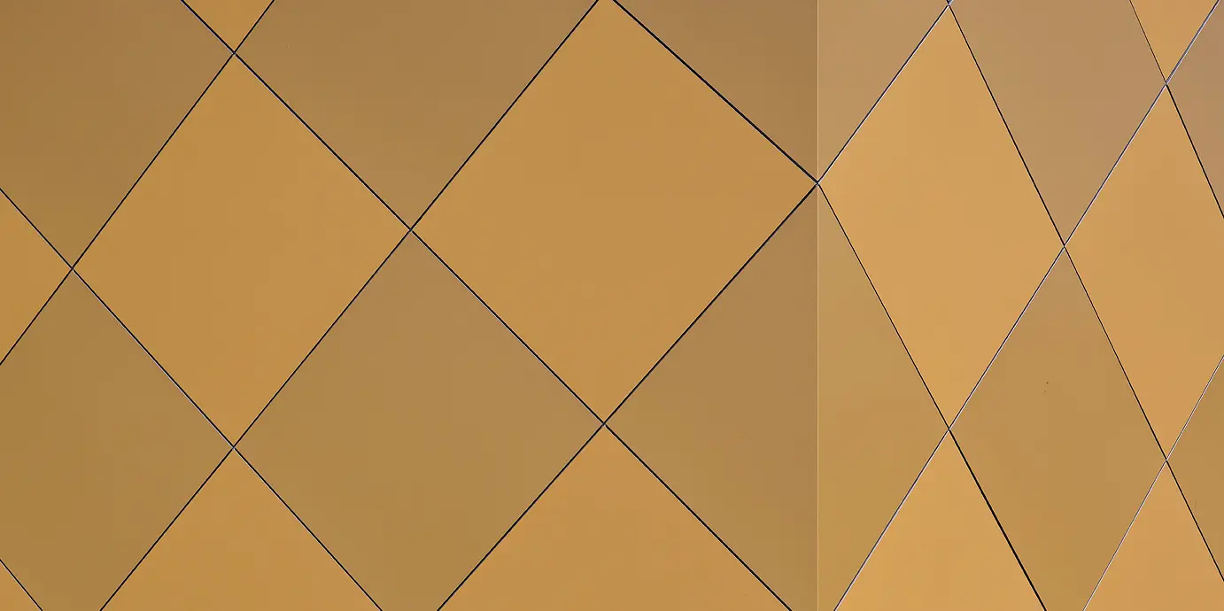Nahaufnahme einer Ecke des Musikvereins in Zwettl. Es sind die karoförmigen PREFA Aluminium Verbundplatten zu sehen, wie sie um die Ecke des Gebäudes gebogen wurden und dadurch für eine homogene Optik sorgen.