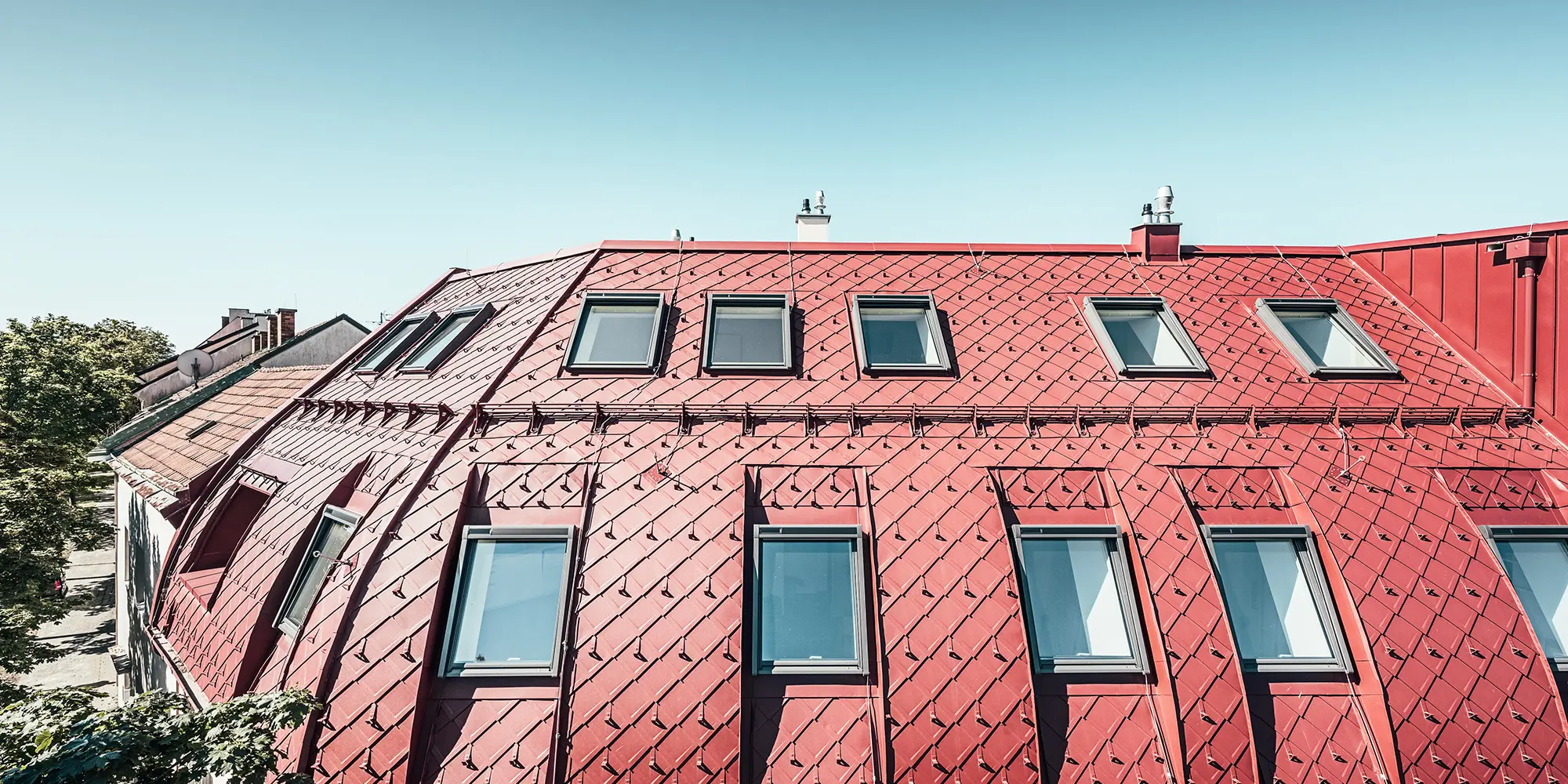Various views and close-ups of the building's roofscape.