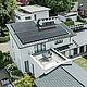 Bird's eye view of the outstanding roof landscape of a detached house in Dortmund with PREFA roof shingles DS.19 and PREFALZ in P.10 anthracite as well as a large-scale PV system