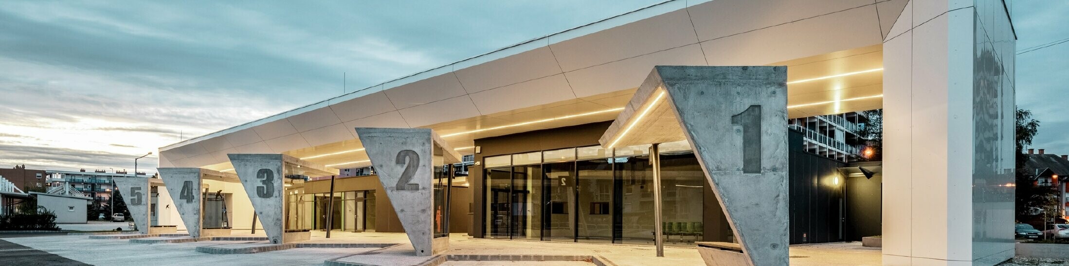 Modern bus station in Lenti, soffits are clad with PREFABOND aluminium composite panels in pure white