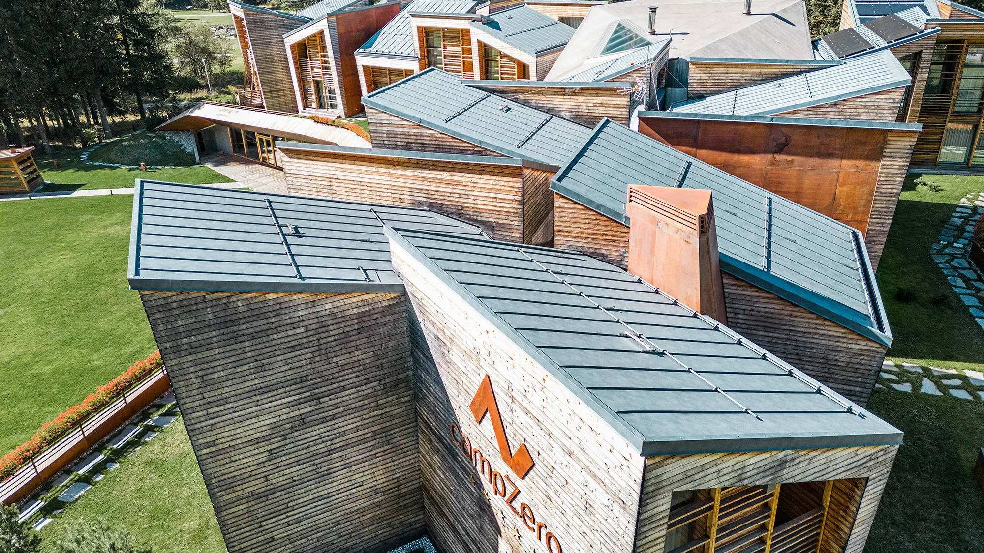 Detail view of one of the sides of the resort, the stone-grey roofscape is in view. 