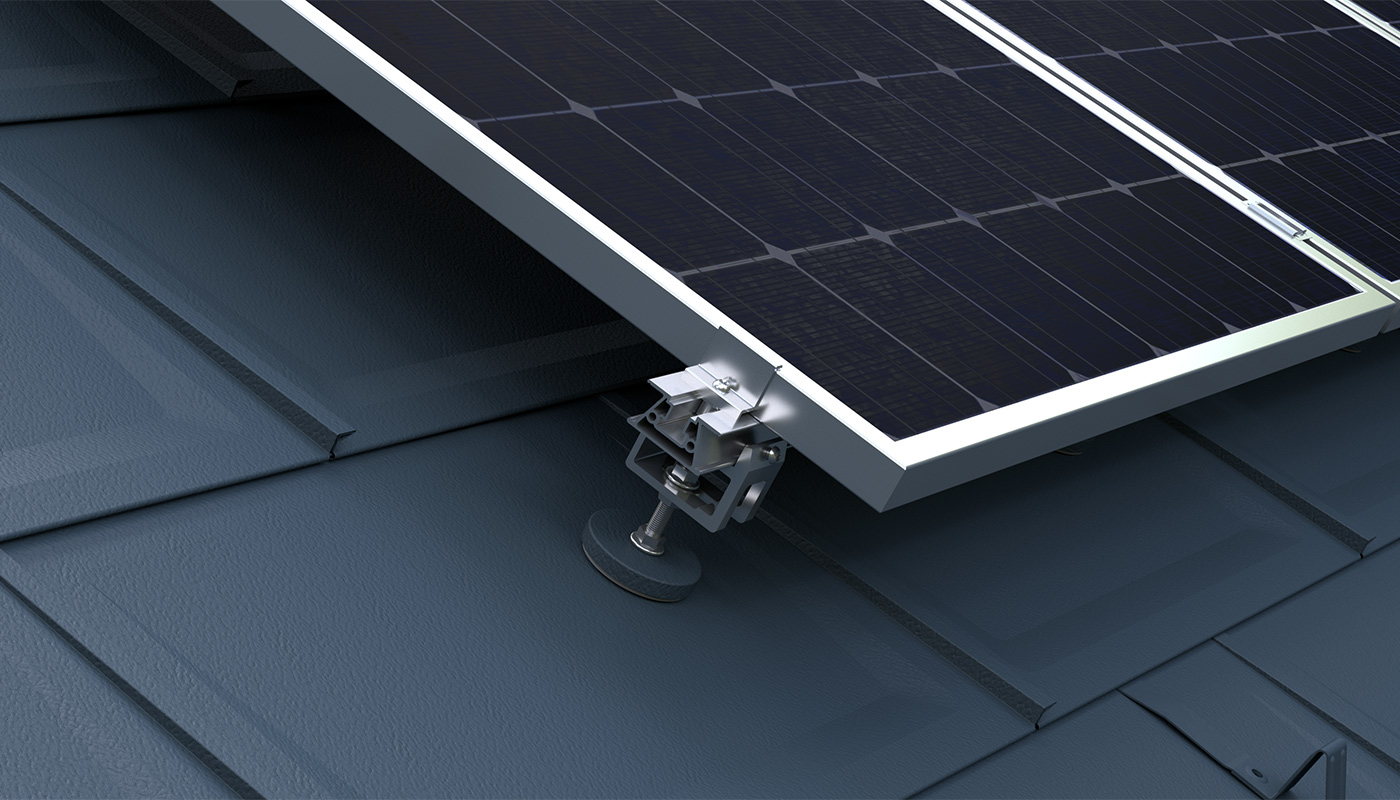 Visible is the PREFA solar mounting system for attaching photovoltaic panels to PREFA roofs.